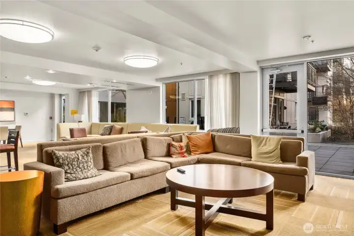 The thoughtfully designed community room is available for resident reservations, making it easy to entertain friends and family in a larger setting