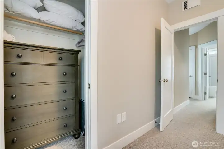 The primary closet offers generous storage.