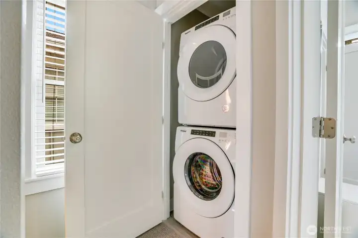 The laundry area is conveniently located upstairs.