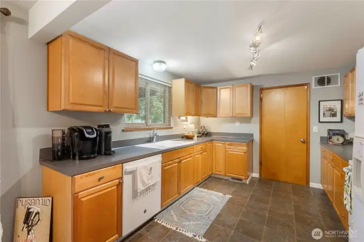Sink window offers a lovely view to the backyard.