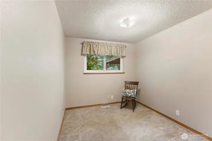 Bedroom #3 faces the backyard.