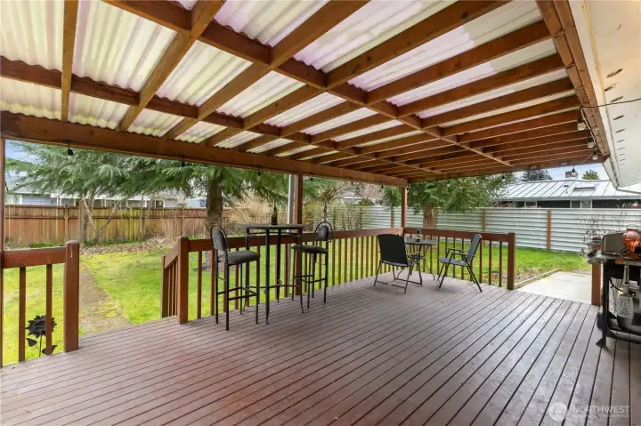 Huge covered deck with lots of room to barbecue and entertain.