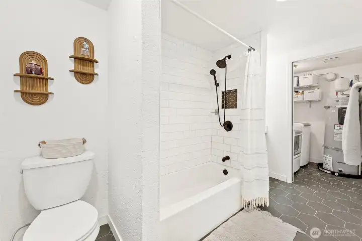 Main Floor Full Bathroom plus Utility room.