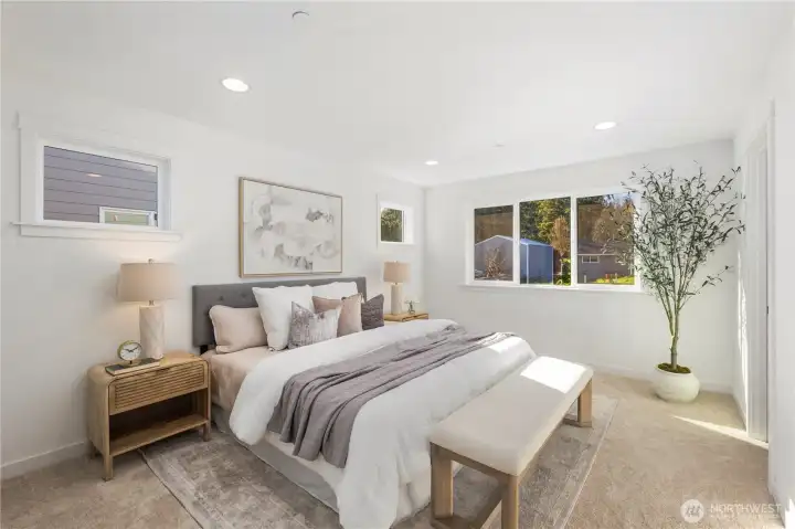 Primary Suite:  Soft natural light fills the primary suite from both a wide rear-facing window and a higher side window that adds privacy while maintaining brightness. The room’s generous proportions comfortably accommodate multiple furniture layouts and create a calm, open retreat at the end of the day. Set within Bothell’s well-connected Canyon Park area, the suite benefits from nearby parks, easy commuter access, and a quiet residential setting that enhances everyday Northwest living. An attached sitting room extends the suite’s livability, offering a flexible place to unwind, read, or create a personalized corner of comfort.    These photos are from Lot 5 at Gooden Hollow, the community model. The home listed will have changes, so all photos, renderings, site maps, and floorplans are for visualization purposes only. Plans, colors, building orientation, finishes, home outlook, and other details can and WILL vary.