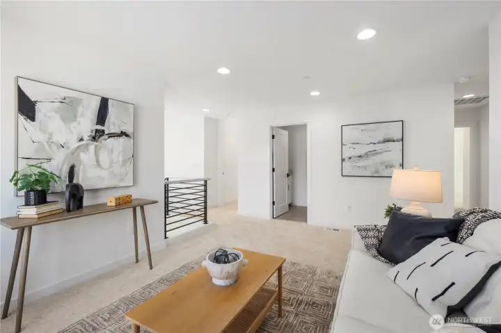 Landing / Upper Hallway:  This open upper landing is bright and inviting, framed by elevated windows that pull in natural light while maintaining privacy. The wide hallway makes the second floor feel connected and easy to navigate, creating a smooth transition between the bedrooms, loft, and primary suite. Its position in Bothell’s Canyon Park area places you minutes from local trails, shops, and the Eastside commuting corridors. Clean modern railings and soft, neutral finishes help the space feel calm and contemporary.    These photos are from Lot 5 at Gooden Hollow, the community model. The home listed will have changes, so all photos, renderings, site maps, and floorplans are for visualization purposes only. Plans, colors, building orientation, finishes, home outlook, and other details can and WILL vary.