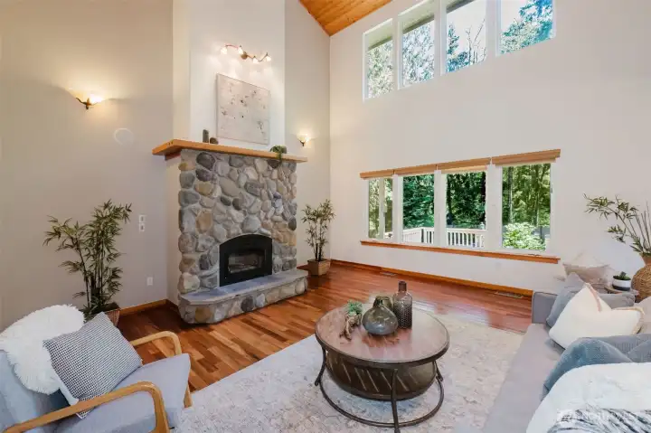 Living room with river rock fireplace