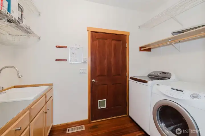 laundry room with counter and sink