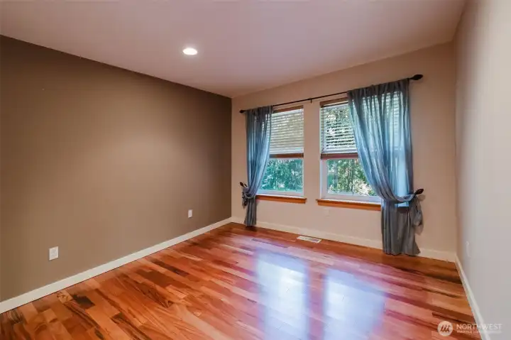 Bedroom 3 with tigerwood floors & walk-in closet