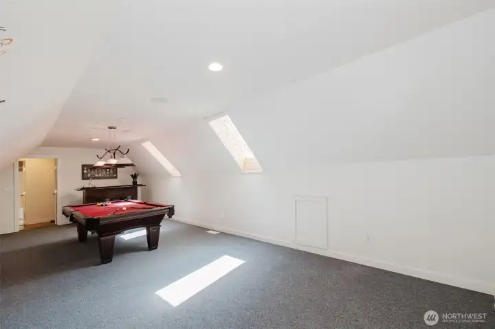 So lage you can have pool table and bar on one side and craft room or media room on the other