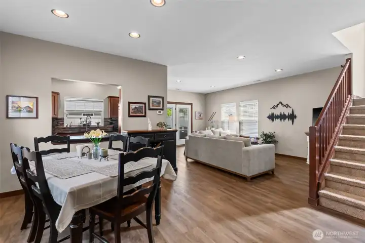 Living, dining kitchen. Plank vinyl easy maintenance main level.