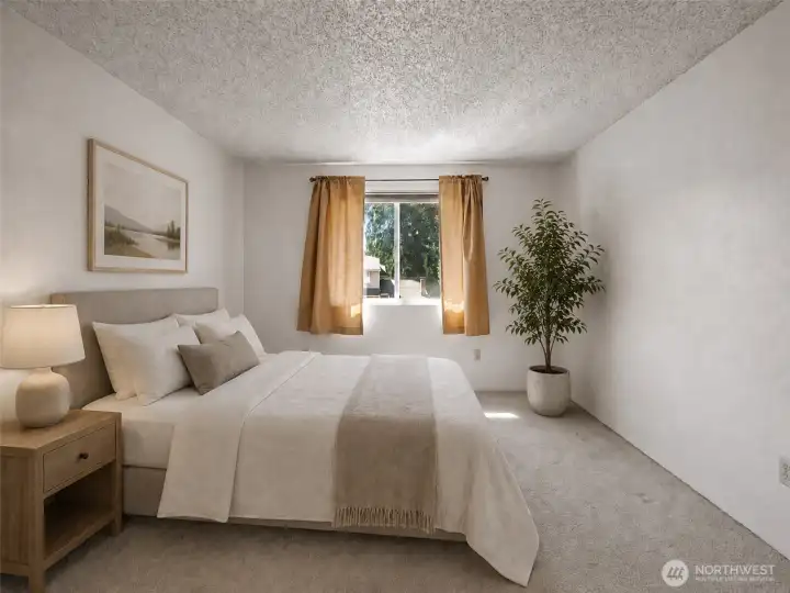 Virtually staged bedroom with front yard view.