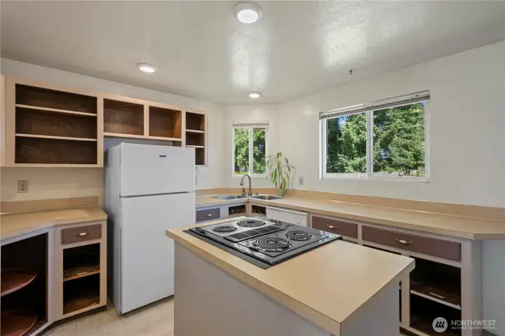 Tenants wanted open cabinet design and after painting, never installed all the doors & hardware, but they all exist for rehanging.
