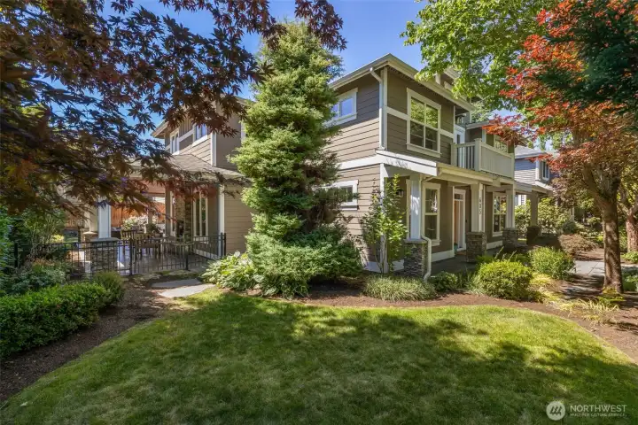 Lushly landscaped years with a Rachio Smart Home Sprinkler System.
