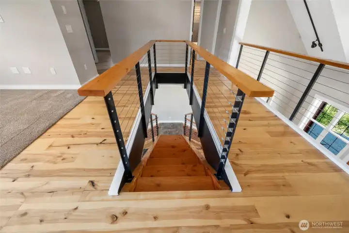 Upstairs loft and entry to the two additional suites. Upstairs loft and entry to the two additional suites.
