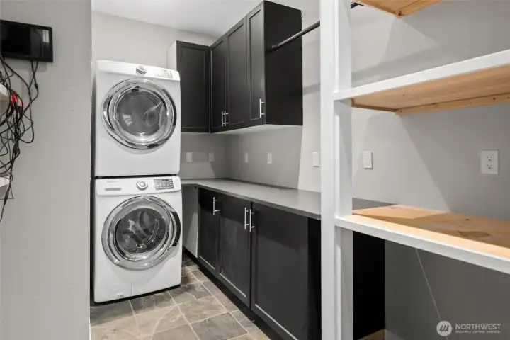 The laundry room is also additional pantry space just off the kitchen. The laundry room is also additional pantry space just off the kitchen.
