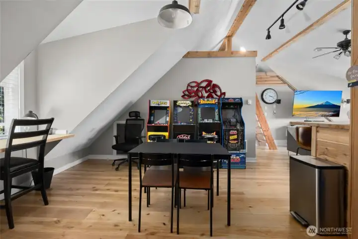 A desk nook, dining area, and some fun, make this space functional and comfrotable. A desk nook, dining area, and some fun, make this space functional and comfrotable.