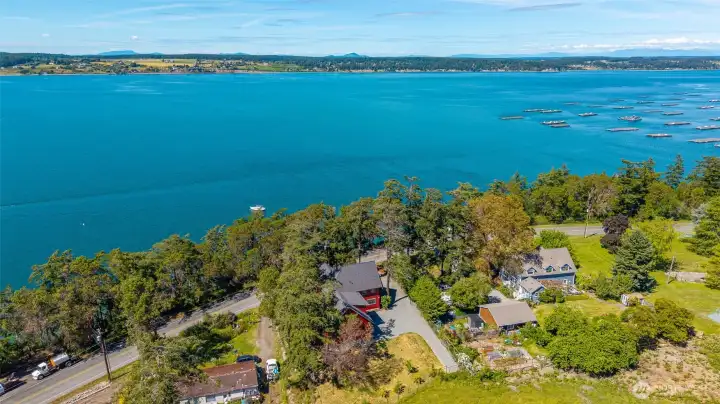 What a setting! Whidbey's Pen Cove Shellfish mussel docks in the distance. What a setting! Whidbey's Pen Cove Shellfish mussel docks in the distance.