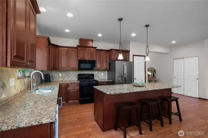 Extra seating at the island. And did I mention this home has 2 pantry’s!