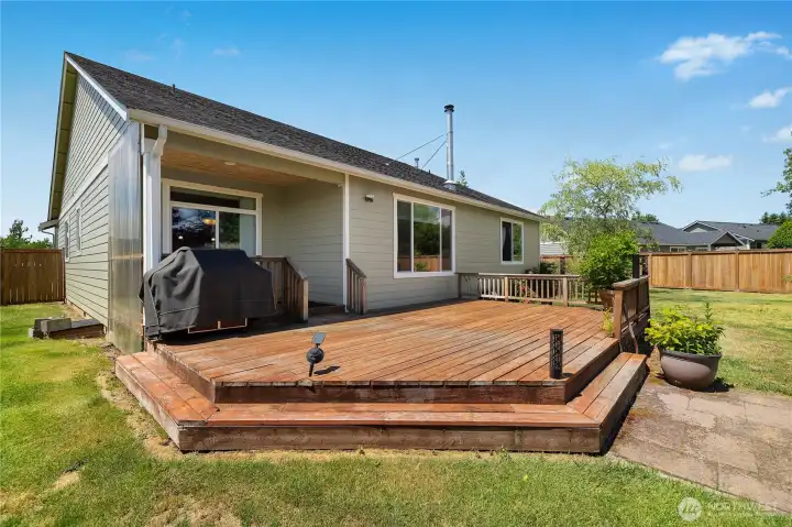 Oversized deck off the back of the house offers great space for entertaining or relaxing while enjoying the view of your beautifully landscaped backyard. Double gates on the right provides RV parking.