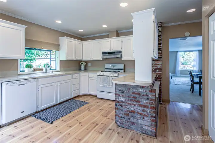 Bright and open kitchen with fantastic storage space. All appliances stay.