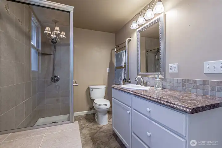 Large main level full bathroom, with heated towel rack