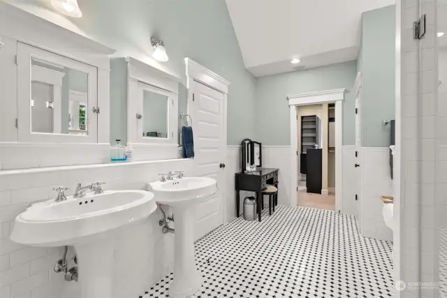 Primary luxury bathroom with heated flooring.