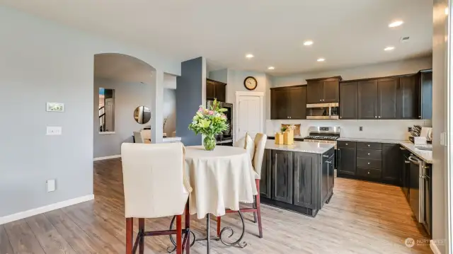 Seamless connection: Enjoy the view from our family room to the inviting eat-in kitchen, where every moment feels connected