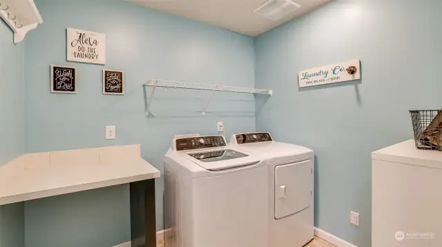 Effortless efficiency: Our spacious and functional laundry room simplifies chores with ample space and smart design