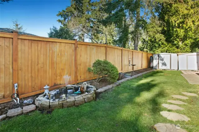 Lovely water feature highlights the brand new fence.