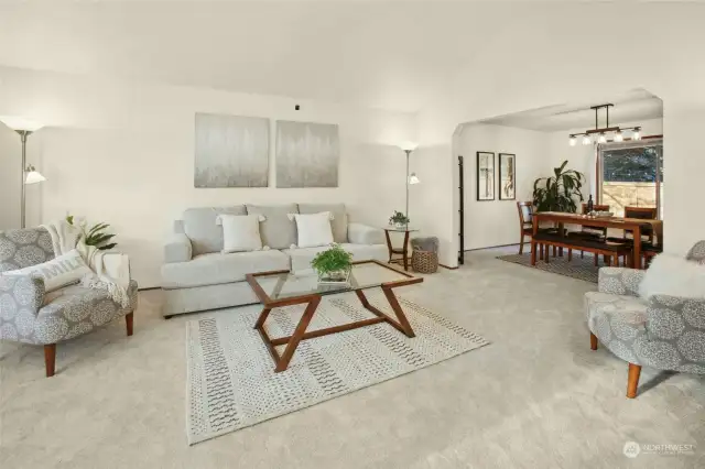 Traditional layout with this living room, dining room adjacent which leads to the kitchen with space for a breakfast table adjacent to the family room.