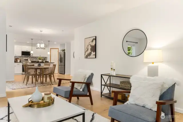 Looking into informal dining room and kitchen from family room.