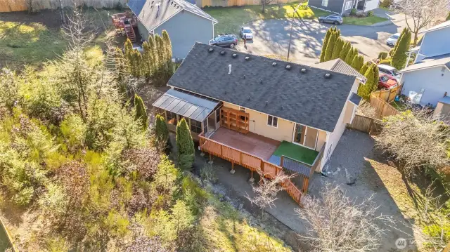 The large deck and fully fenced backyard are great for fun, furry friends and entertaining.