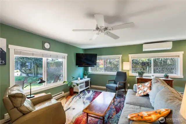 Living room with LVP flooring & double pane windows