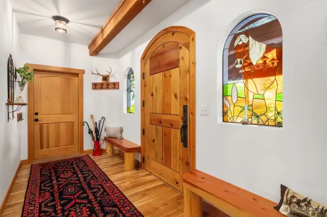 Entry with Custom Seating, access to 2 car attached garage