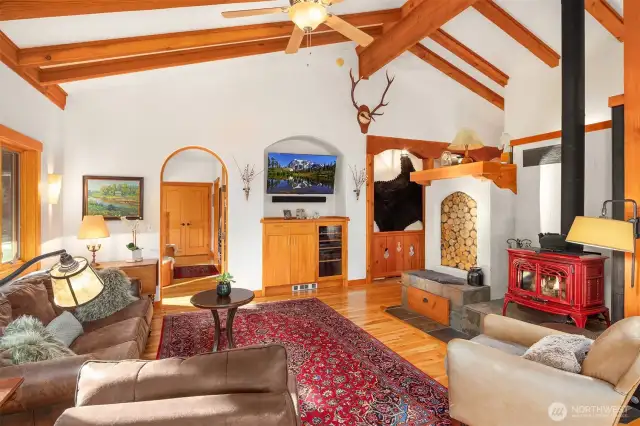 Living/Open Concept, Access to Primary Suite through custom reclaimed wood door