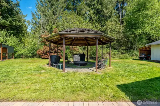 Gather around for a story under the stars, a smore, and a cozy fire in the gazebo.