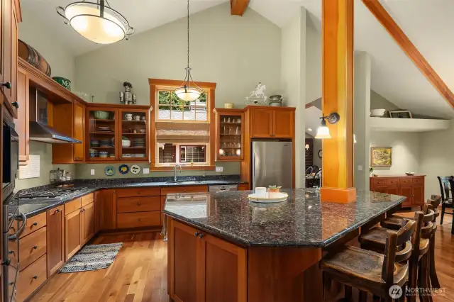 Kitchen with bar seating providing ample room for entertainment.