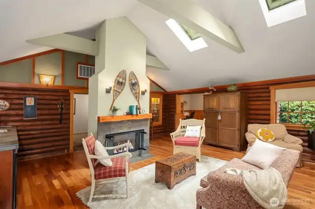 Open flowing sitting room with ample natural light.
