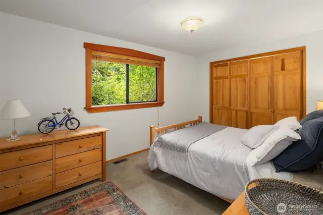 Bedroom with ample closet storage.