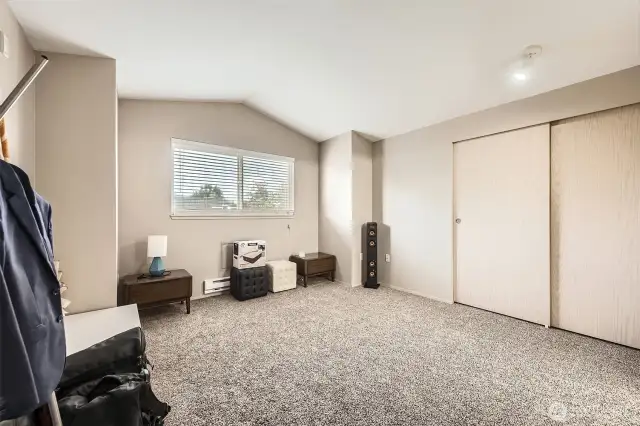 Second bedroom is atop the stairs, also large with full bath ensuite