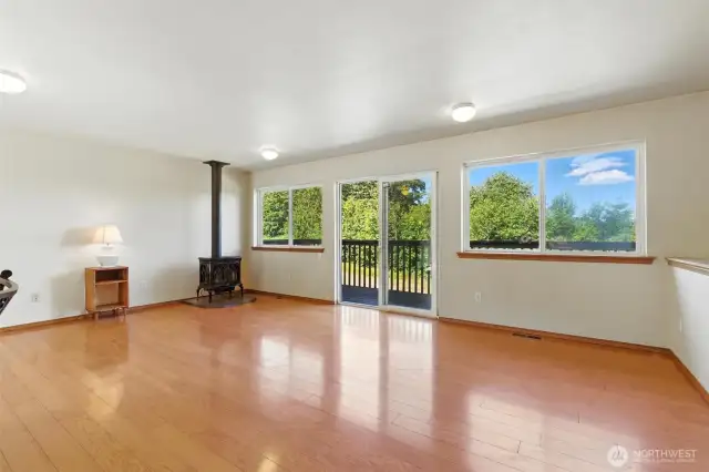 Main floor living with wood floors throughout upstairs