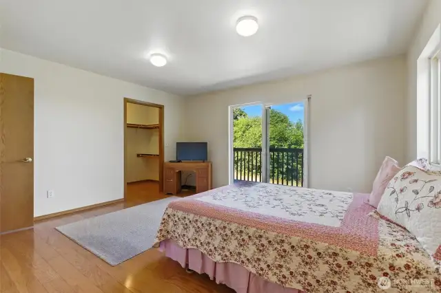 Primary bedroom with access to the deck