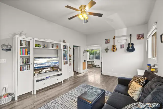 Expansive living space, high ceilings and great amount of natural light make this area live large