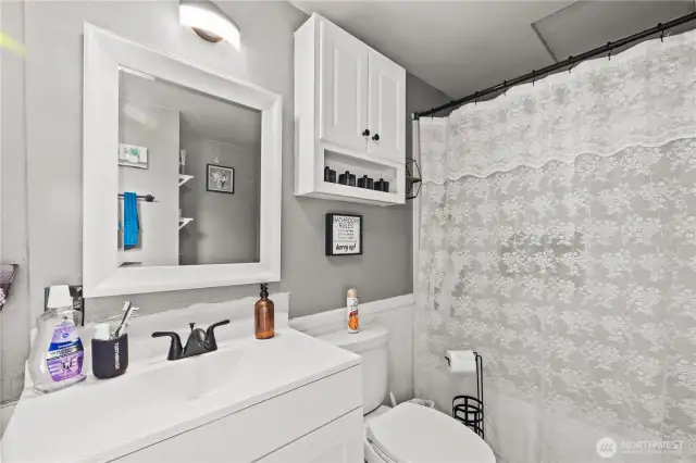 View from near laundry to bath and sink
