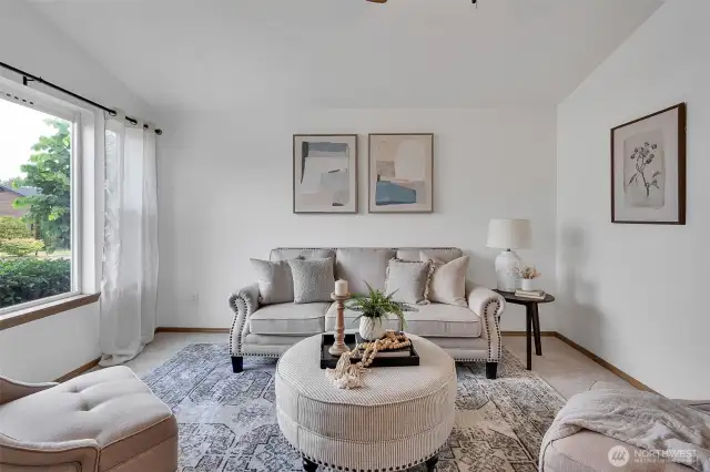 Welcome your guests here in the formal living room.