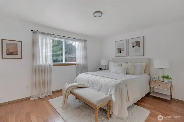 The primary bedroom offers a neutral pallet for your own design.