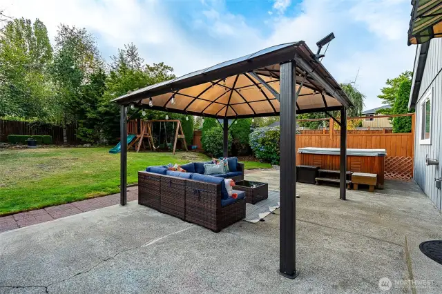 The pergola provides a pleasant space for relaxing and stays with the home.