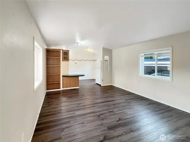 Step inside to discover an open floor plan with laminate flooring.