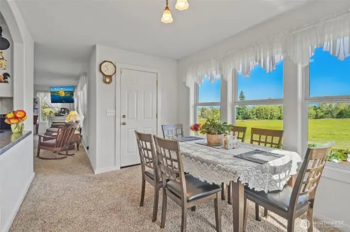 Dining room facing living room and door to back deck