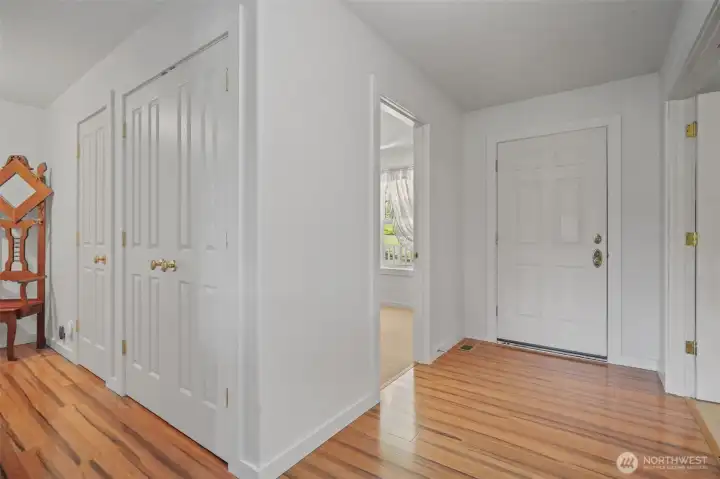 Entry, hallway with storage and bedroom entrance